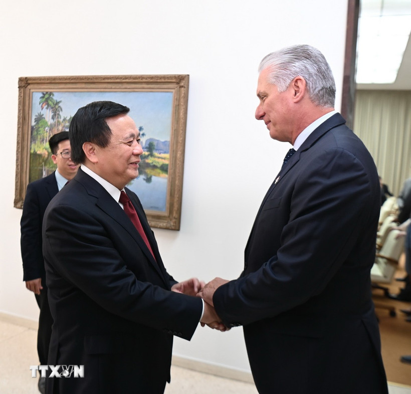 Bí thư thứ nhất, Chủ tịch Cuba Miguel Díaz-Canel Bermúdez tiếp ông Nguyễn Xuân Thắng, Ủy viên Bộ Chính trị, Giám đốc Học viện Chính trị Quốc gia Hồ Chí Minh, Chủ tịch Hội đồng Lý luận Trung ương. (Ảnh: Việt Hùng/TTXVN)