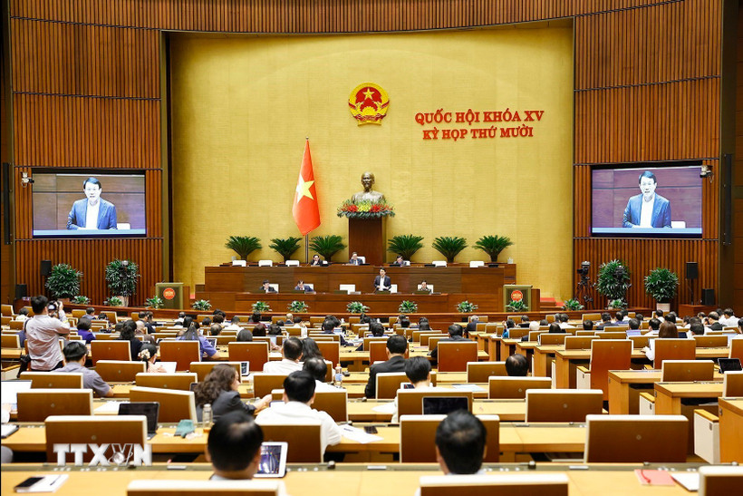 Bộ trưởng Bộ Công an Lương Tam Quang giải trình, làm rõ một số vấn đề đại biểu Quốc hội nêu. (Ảnh: Doãn Tấn/TTXVN)