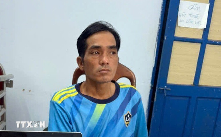 Đối tượng Hợp tại cơ quan công an. (Ảnh: TTXVN phát)