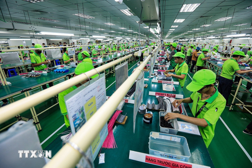 Hoạt động sản xuất tại một công ty ở thành phố Hòa Bình, tỉnh Hòa Bình. (Ảnh: Trọng Đạt/TTXVN)