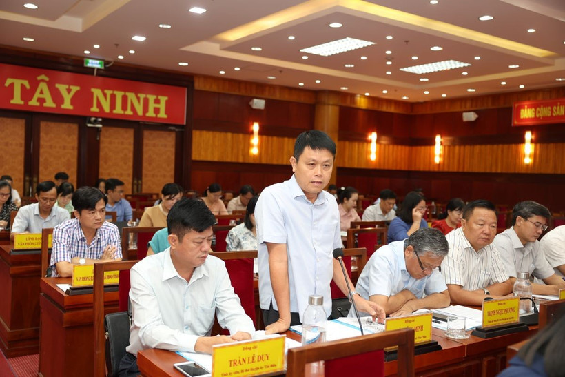 Các đại biểu tham gia thảo luận, đóng góp ý kến đối với Đề án tổ chức lại đơn vị hành chính cấp xã trên địa bàn tỉnh Tây Ninh. (Ảnh: Thanh Tân/TTXVN)