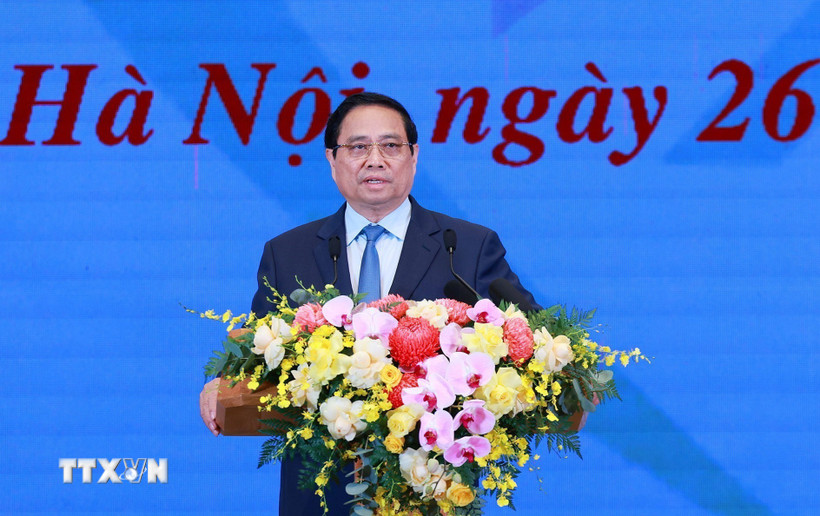 Thủ tướng Phạm Minh Chính phát biểu tại Hội nghị tổng kết Chương trình và Phong trào thi đua “Cả nước chung tay xóa nhà tạm, nhà dột nát”. (Ảnh: Dương Giang/TTXVN)