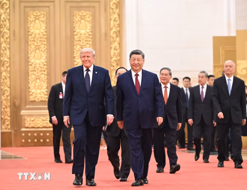 Chủ tịch Trung Quốc Tập Cận Bình (phải, phía trước) chủ trì tiệc chiêu đãi Tổng thống Mỹ Donald Trump (trái, phía trước) đang ở thăm Bắc Kinh, ngày 14/5/2026. (Ảnh: THX/TTXVN)