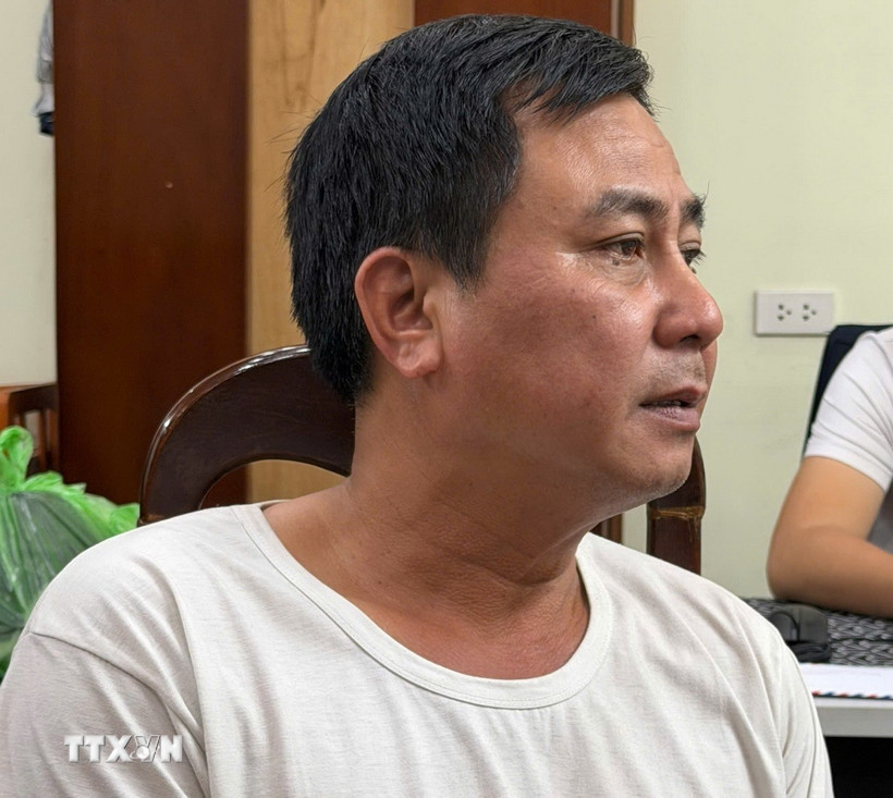 Lái xe Nguyễn Quang Thinh tại cơ quan điều tra. (Ảnh: TTXVN phát)