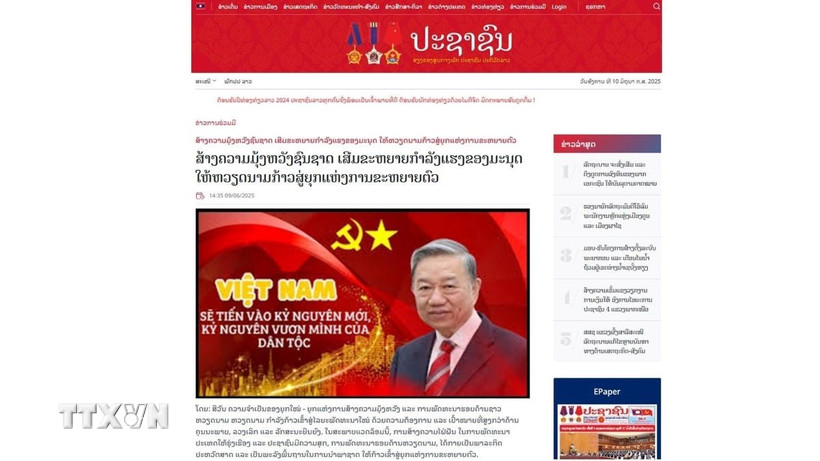 Bài viết đăng trên báo điện tử Pasaxon, cơ quan ngôn luận của Trung ương Đảng Nhân dân cách mạng Lào, số ra ngày 9/6. (Ảnh: TTXVN phát)