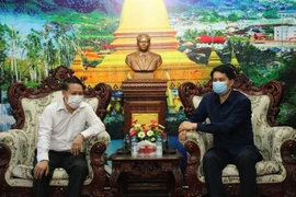 Người Việt ở Bắc Lào chung tay hỗ trợ chính quyền khống chế dịch bệnh