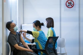 Người dân Hong Kong đi tiêm vaccine có thể trúng nhà 32 tỷ đồng