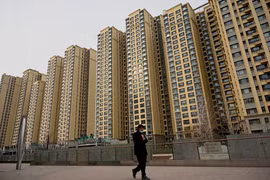 Fitch: Các công ty bất động sản Trung Quốc thiếu tiền mặt nghiêm trọng