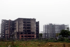 Hiện trạng Bệnh viện đa khoa tỉnh Nam Định (trước đây là dự án đầu tư xây dựng Bệnh viện đa khoa quy mô 700 giường tỉnh Nam Định) sau khi dừng thi công từ năm 2012. (Ảnh: Văn Đạt/TTXVN)