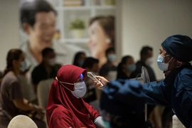 Dịch COVID-19: Indonesia và Malaysia ghi nhận hàng nghìn ca nhiễm mới
