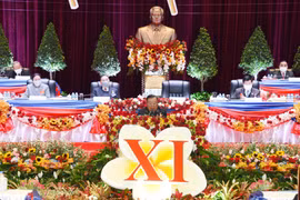 Tổng Bí thư, Chủ tịch nước Cộng hòa Dân chủ Nhân dân Lào Bounnhang Vorachith đọc diễn văn khai mạc Đại hội. (Ảnh: TTXVN phát)