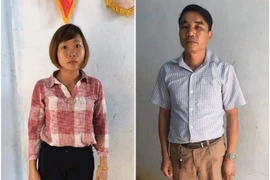 Đối tượng Trịnh Thị Hoài và Nhâm Tiến Dũng. (Ảnh: TTXVN phát)