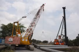 Công trường xây dựng tại nút giao Thân Cửu Nghĩa (Tiền Giang), thuộc Dự án Trung Lương - Mỹ Thuận. (Ảnh: Tiến Lực/TTXVN)