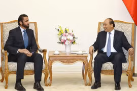  Thủ tướng Nguyễn Xuân Phúc tiếp ông Mohammed Ibrahim Al Shaibani, Tổng giám đốc điều hành Tập đoàn Đầu tư Dubai. (Ảnh: Thống Nhất/TTXVN) 