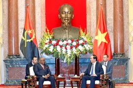 Chủ tịch nước Trần Đại Quang tiếp Bộ trưởng Ngoại giao Cộng hòa Angola, Georges Rebelo Pinto Chikoti sang thăm chính thức Việt Nam. (Ảnh: Nhan Sáng/TTXVN)