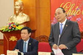 Phó Thủ tướng Nguyễn Xuân Phúc phát biểu tại buổi làm việc. (Ảnh: An Đăng/TTXVN)