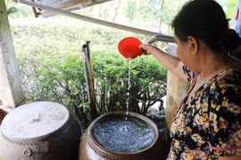 Đảm bảo việc tiếp cận nước sạch và cải thiện điều kiện vệ sinh cho tất cả mọi người. (Nguồn ảnh: TTXVN)