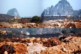 Tàu chở than của Tuyển than Cửa Ông chở xít ra đổ tại bãi thải khổng lồ ở phường Cẩm Thịnh, thành phố Cẩm Phả. (Ảnh: P.V/Vietnam+)