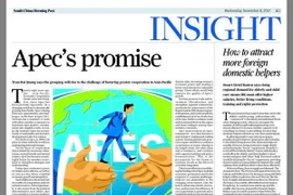 Bài viết của Chủ tịch nước Trần Đại Quang được đăng trên báo Bưu điện Hoa Nam buổi sáng của Hong Kong. (Ảnh: Trần Hoài Nam/Vietnam+)