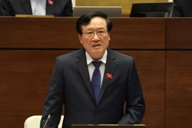 Chánh án Tòa án nhân dân Tối cao Nguyễn Hòa Bình trả lời chất vấn của đại biểu Quốc hội. (Ảnh: Phương Hoa/TTXVN)