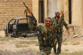 Các lực lượng Syria trong chiến dịch chống IS tại Deir Ezzor ngày 24/9. (Nguồn: AFP/TTXVN)