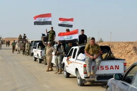 Các lực lượng Iraq tiến vào khu vực Anna, tỉnh Anbar trong chiến dịch chống IS ngày 19/9. (Nguồn: AFP/TTXVN)