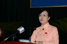 Chủ tịch Hội đồng Nhân dân Thành phố Hồ Chí Minh Nguyễn Thị Quyết Tâm phát biểu khai mạc kỳ họp. (Ảnh: Thanh Vũ/TTXVN) 