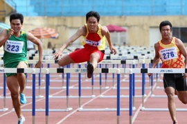 Các vận động viên tại Giải điền kinh trẻ quốc gia năm 2014. (Ảnh: Quốc Khánh/TTXVN)