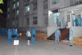 Các công dân được bố trí cách ly tập trung tại Khu nhà ở sinh viên (Phường 1, Thành phố Bạc Liêu). (Ảnh: Chanh Đa/TTXVN)