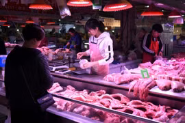Một cửa hàng thịt ở Trung Quốc. (Ảnh: AFP)