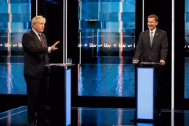 Cựu Ngoại trưởng Anh Boris Johnson và Ngoại trưởng đương nhiệm Jeremy Hunt. (Ảnh: AFP/TTXVN) 