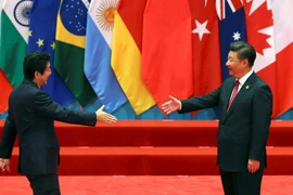 Thủ tướng Nhật Bản Shinzo Abe và Chủ tịch Trung Quốc Tập Cận Bình. (Ảnh: Nikkei)