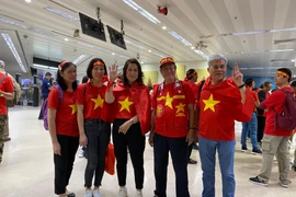 Các cổ động viên sẵn sàng "cháy hết mình" vì chiếc huy chương Vàng. (Ảnh: Vietnam+) 