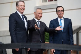 Các nhà đàm phán thương mại hàng đầu của Mỹ và Trung Quốc. (Ảnh: AFP/TTXVN)