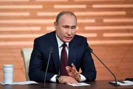 Tổng thống Vladimir Putin trong buổi họp báo cuối năm. (Ảnh: AFP/TTXVN)