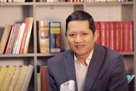 Tiến sỹ Nguyễn Quốc Hùng, nghiên cứu viên cấp cao Trung tâm chiến lược Nga tại châu Á, Viện kinh tế, Viện Hàn lâm khoa học Nga. (Ảnh: Trần Hiếu/Vietnam+)