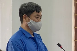 Bị cáo Đỗ Văn Minh bị tuyên án tử hình tại phiên tòa phúc thẩm. (Ảnh: Hưng Thịnh/TTXVN)