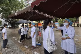 Thí sinh đến dự kỳ thi tốt nghiệp Trung học Phổ thông năm 2021. (Ảnh: Minh Quyết/TTXVN)
