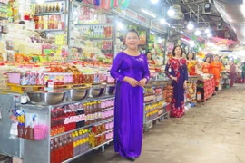 [Photo] Huế: Tiểu thương chợ Đông Ba tôn vinh giá trị áo dài 
