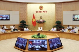 Phó Thủ tướng Lê Văn Thành phát biểu tại cuộc họp. (Ảnh: An Đăng/TTXVN)