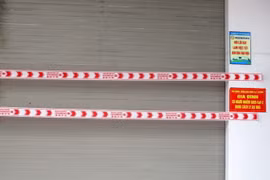 Một gia đình có người mắc COVID-19 được điều trị, cách ly tại nhà trên địa bàn thành phố Thanh Hóa. (Ảnh: Nguyễn Nam/TTXVN)