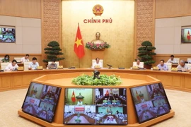 Phó Thủ tướng Lê Văn Thành chủ trì cuộc họp. (Ảnh: Lâm Khánh/TTXVN)