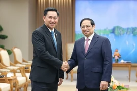 Thủ tướng Phạm Minh Chính tiếp Bộ trưởng, Chủ nhiệm Văn phòng Phủ Thủ tướng Lào Alounxai Sounnalath. (Ảnh: Dương Giang/TTXVN)
