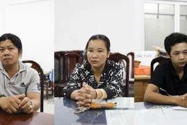 Nguyễn Hữu Thông, Nguyễn Thị Kim Thu và Nguyễn Minh Tâm (từ trái qua) tại cơ quan Công an. (Ảnh: TTXVN phát)