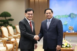 Thủ tướng Phạm Minh Chính tiếp Phó Thủ tướng Singapore Heng Swee Keat. (Ảnh: Dương Giang/TTXVN)