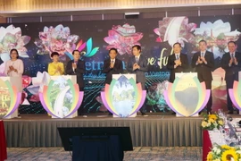 Nghi thức phát động mở lại hoạt động du lịch. (Ảnh: Văn Đức/TTXVN)