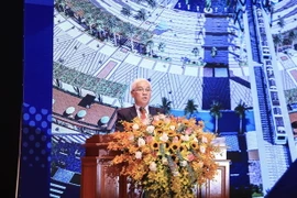 Bí thư Tỉnh ủy Bình Dương Nguyễn Văn Lợi phát biểu tại Hội thảo. (Ảnh: Chí Tưởng/TTXVN)