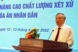 Ông Nguyễn Hòa Bình, Ủy viên Bộ Chính trị, Bí thư Trung ương đảng, Chánh án Tòa án Nhân dân Tối cao phát biểu tại Hội nghị. (Ảnh: Tường Vi/TTXVN)