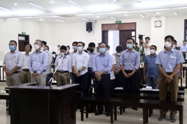 Các bị cáo tại phiên xét xử phúc thẩm. (Ảnh: Phạm Kiên/TTXVN)