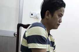 Tài xế An tại cơ quan công an. (Ảnh: Đậu Tất Thành/TTXVN phát)